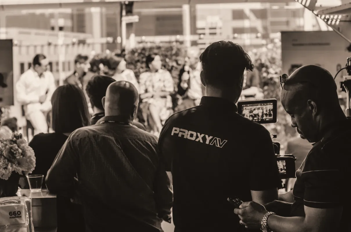 Founders and guests talking at an in-person startup event